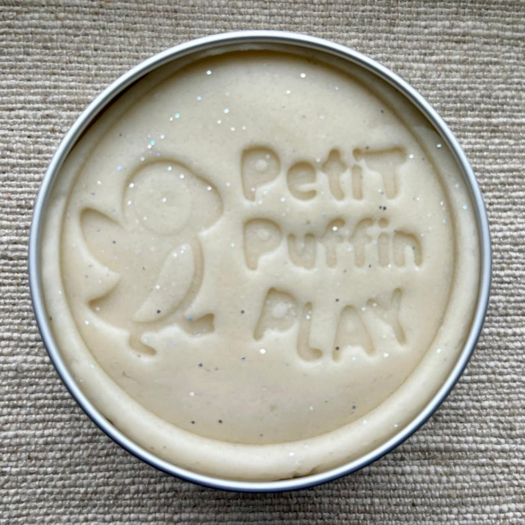 a tin of handmade white playdough with biodegradable glitter